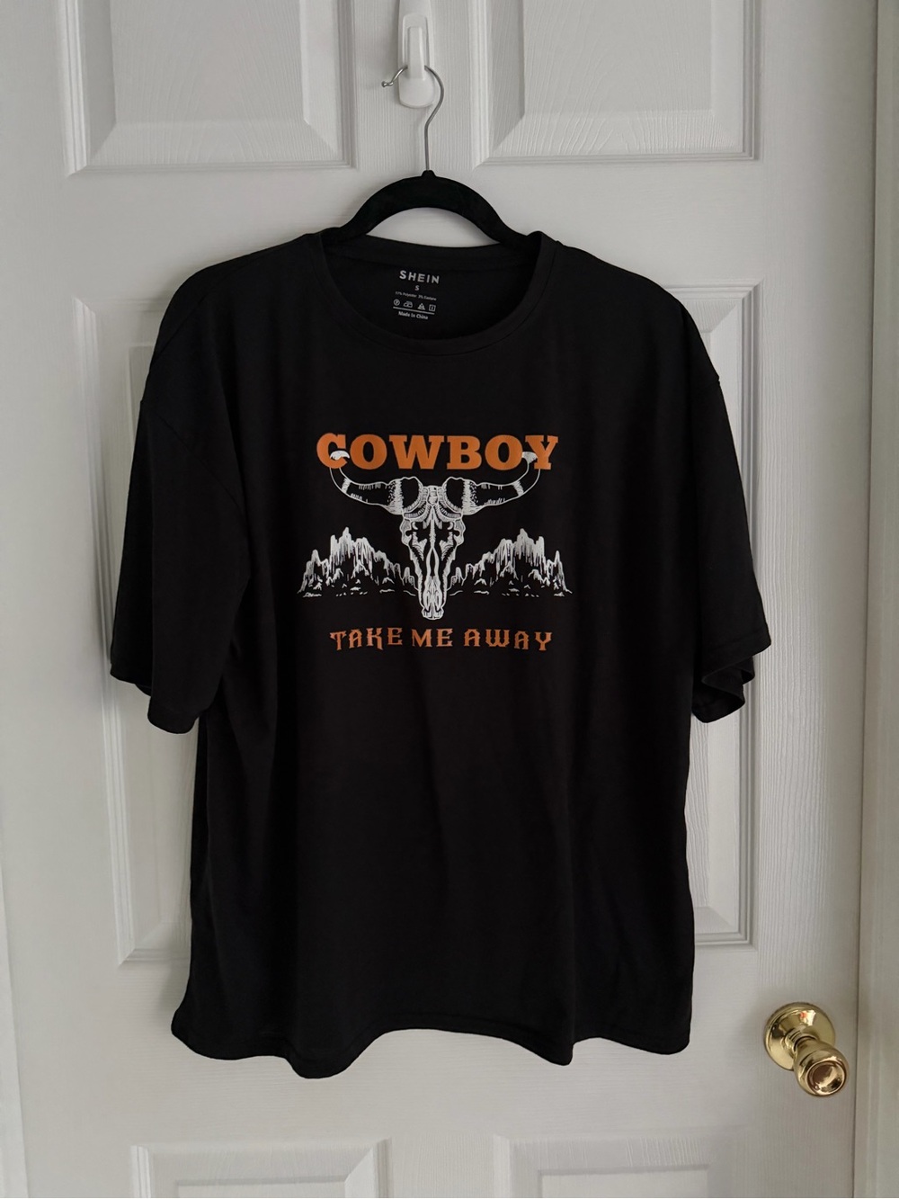SHEIN Oversized Black Graphic Tee with Orange 'COWBOY' Lettering